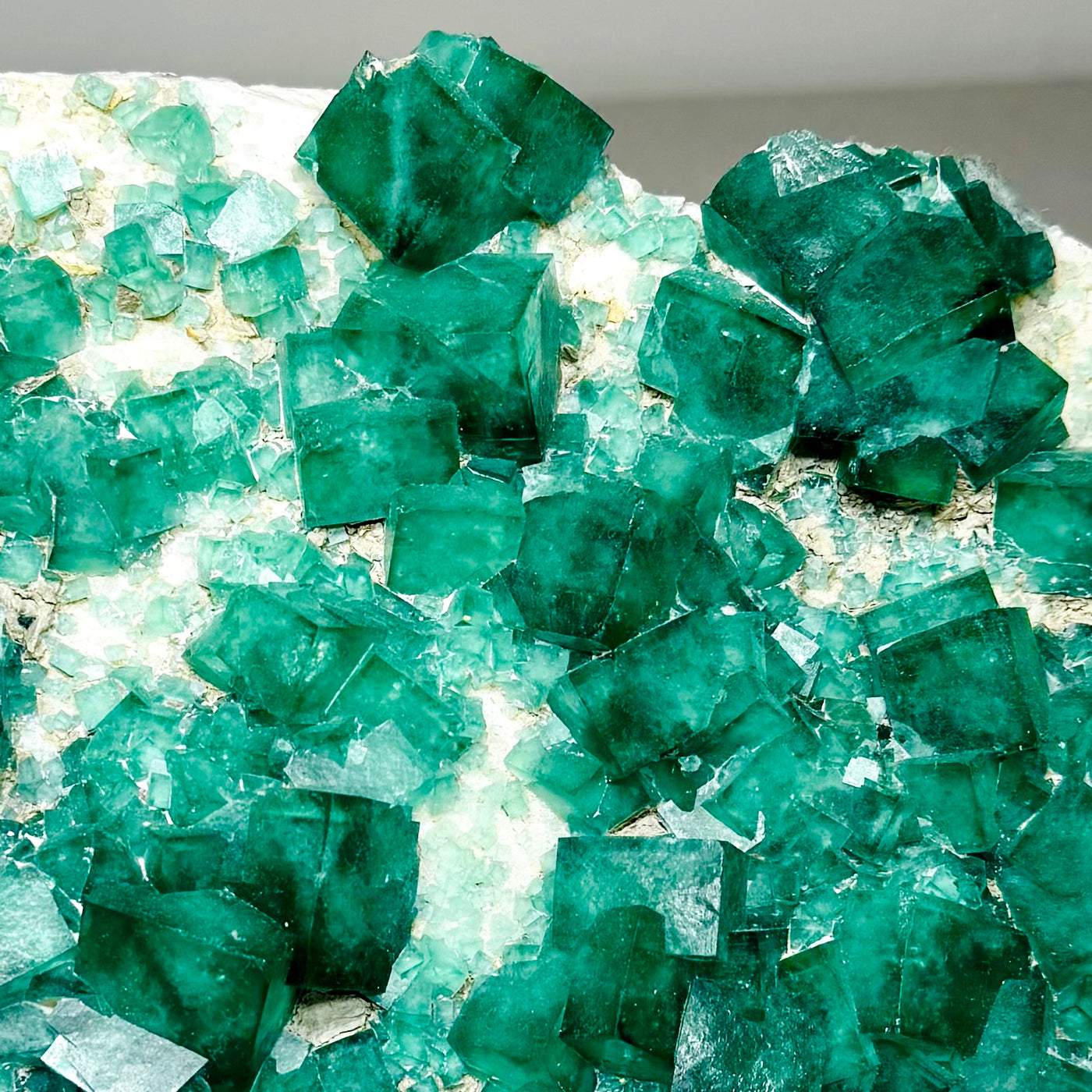 Close view of emerald green cubic fluorite crystals