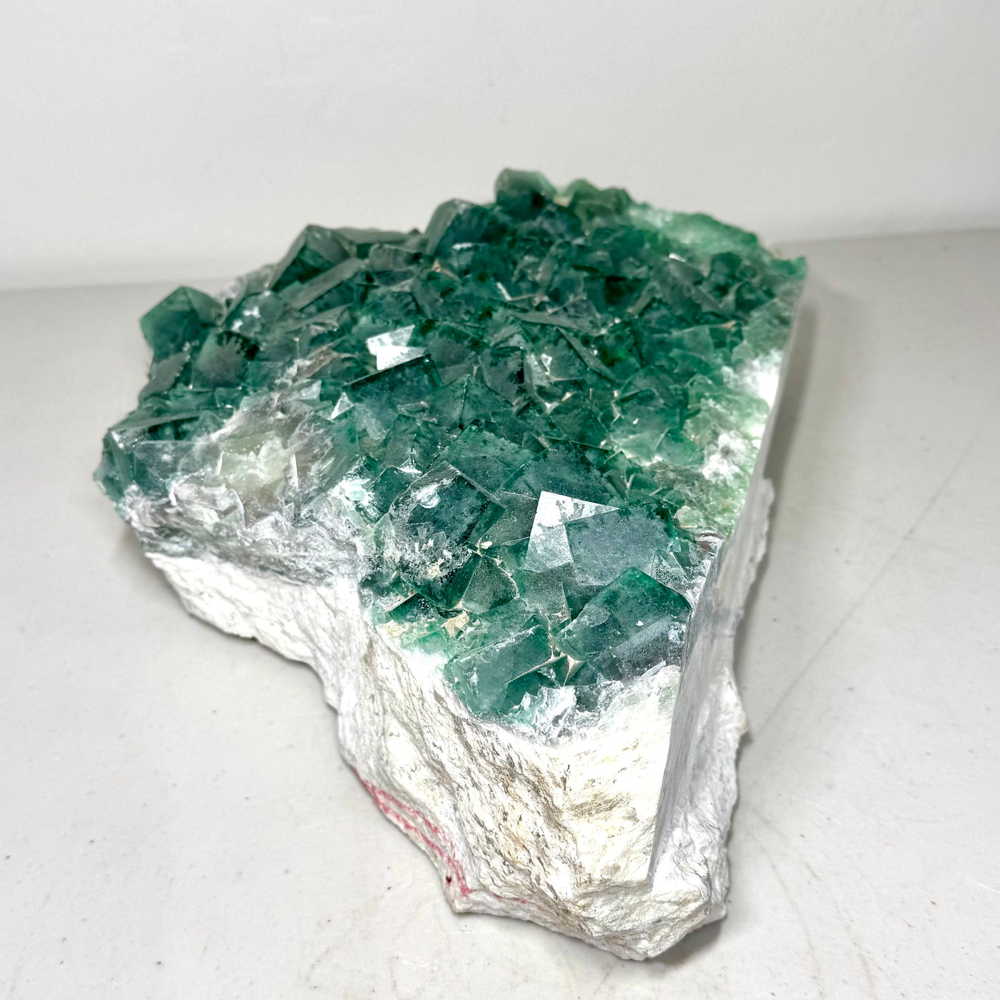 Side view of the 33.5 lb green fluorite cubic cluster