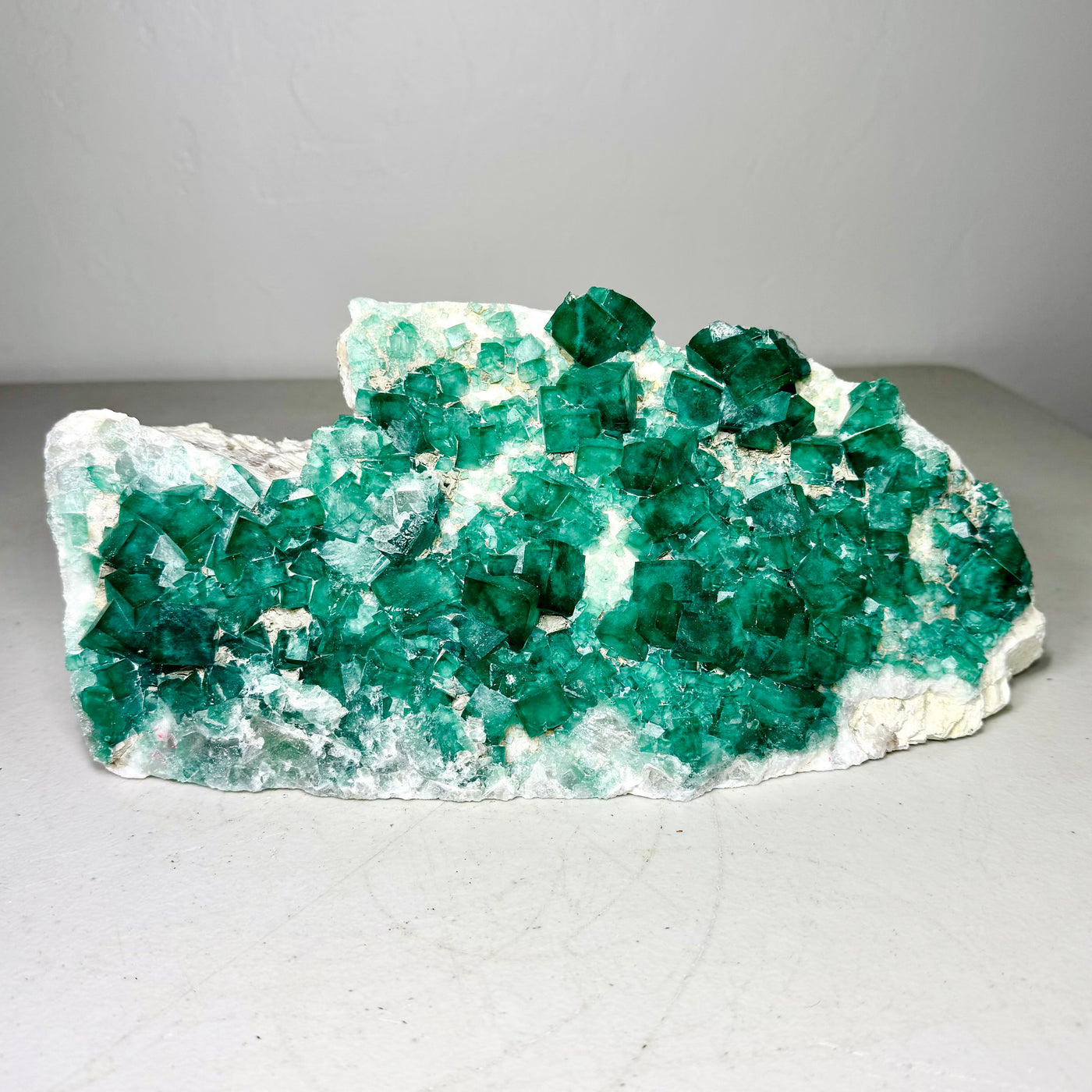 Green fluorite crystals on white-beige matrix, alternate view