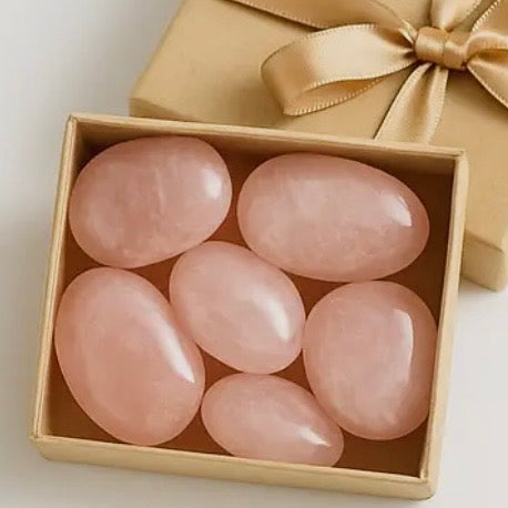 Close view of handpicked rose quartz palm stone bulk lot