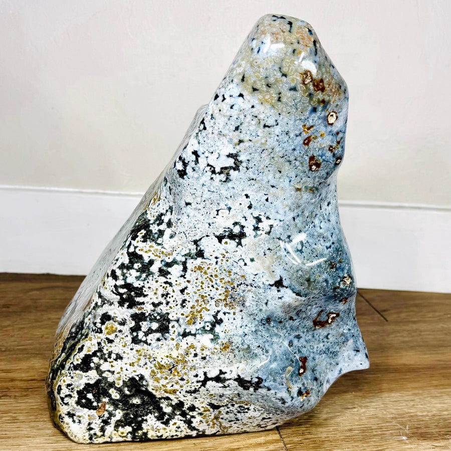 Blue orbicular jasper freeform with pale blue-white patterns and dark patches, 32.7 lb