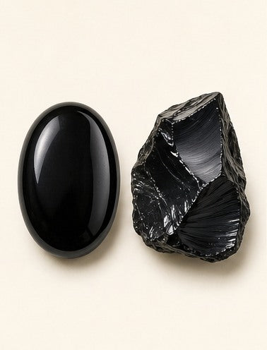 Obsidian shown as a polished palm-stone or cabochon form beside a rough form in a generated educational comparison illustration