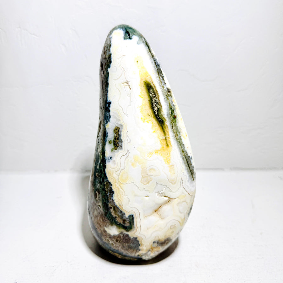 Ocean Jasper AE114, cream face edged with green and ochre bands, 6.3 lb polished freeform