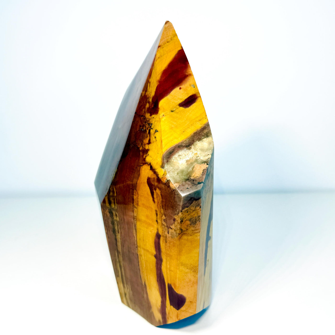 Sunset Jasper freeform showing red and golden vertical banding