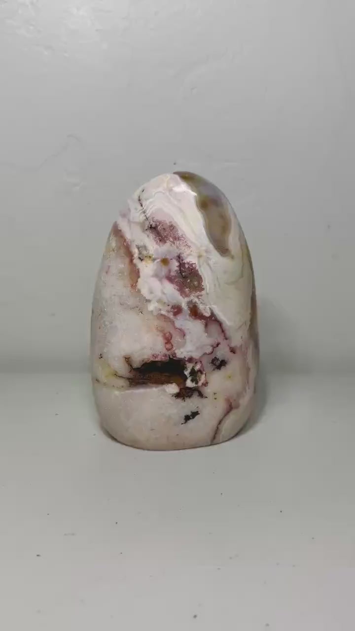 Video of one-of-a-kind pink amethyst freeform ML-163 rotating to show its banded patterning
