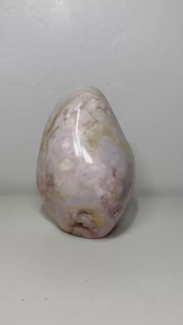 Video of one-of-a-kind pink amethyst freeform ML-165 rotating to show its rounded blush-lavender form